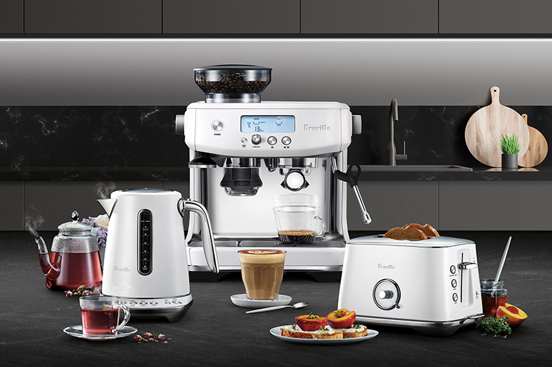 Display of sea salt colour variety kettle, espresso machine and toaster.