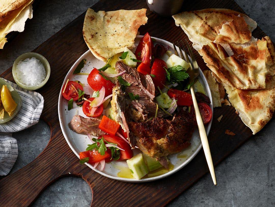Slow Roasted Lamb Shoulder with Tomato and Olive Salad
