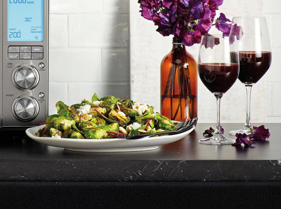 Brussels Sprouts with Pomegranate Vinaigrette and Goat Cheese